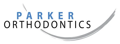 Parker Orthodontics logo featuring blue and black text with curved gray smile arc design below.